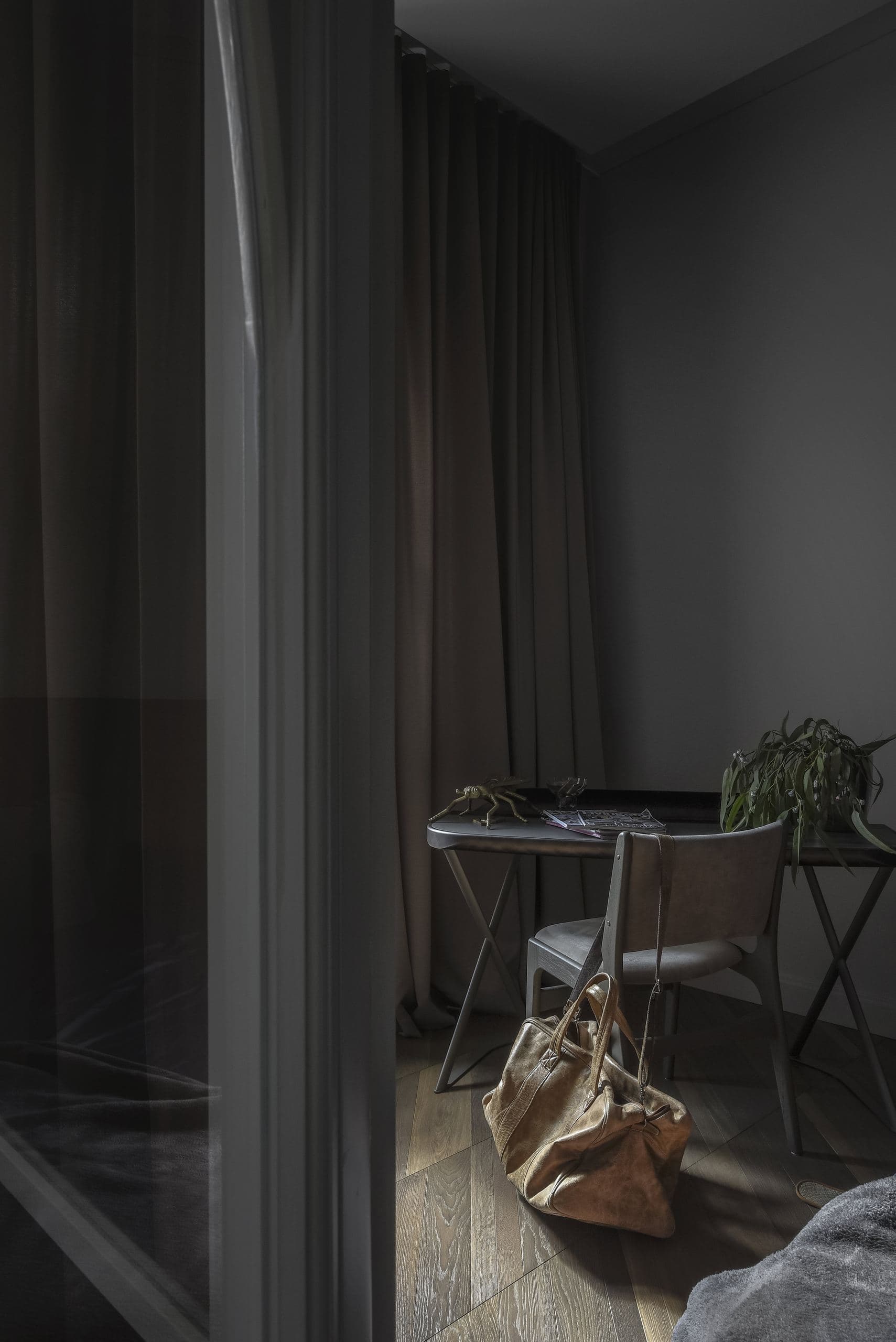 City Avenue Apartment — desk and chair beside a mirrored wall