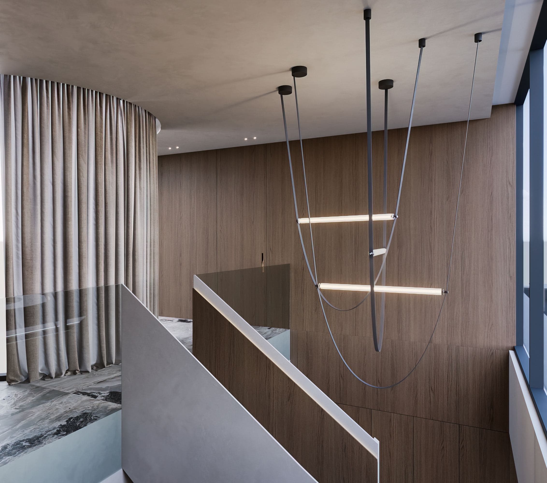 IN JAN House Interior — pendant lights above a glass-balustraded stair landing