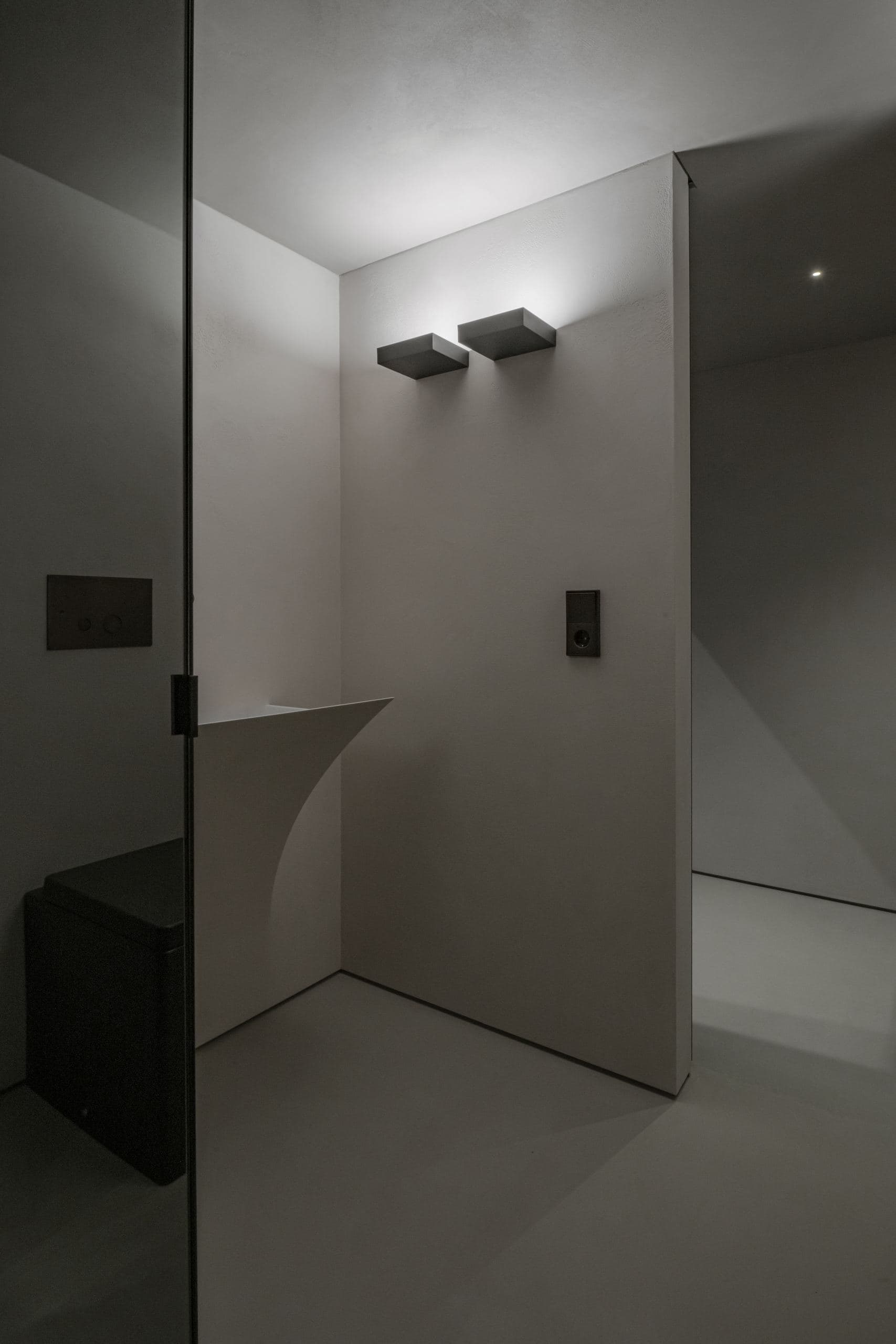 Loft Office — dark timber wall meeting the angled beam ceiling
