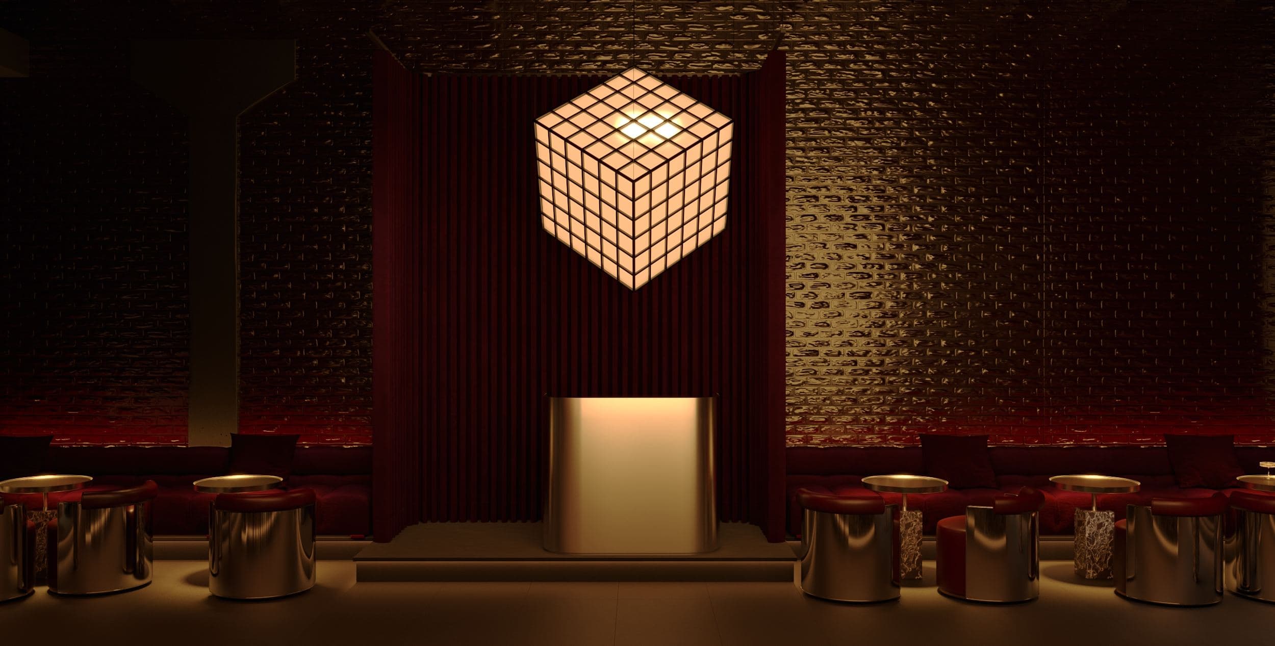 MADA Cocktail Bar — cube pendant light above a booth beside red curtains